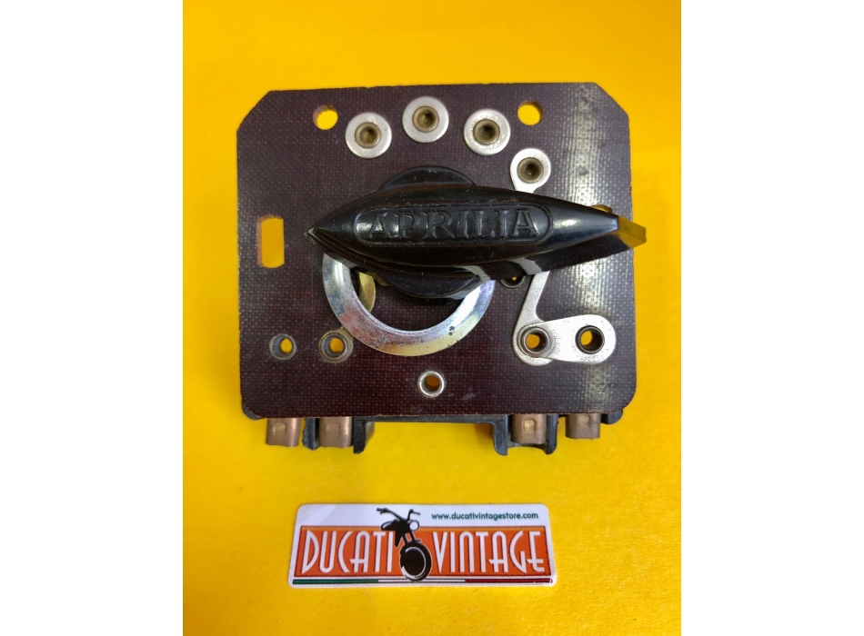 Interruttore commutatore luci ORIGINALE, nuovo, per fanale anteriore Aprilia Ø 130 e Ø 150 mm per Ducati carter stretti e carter larghi, Ducati Elité, Mach1,MK3, Monza, Ducati Scrambler 1° serie